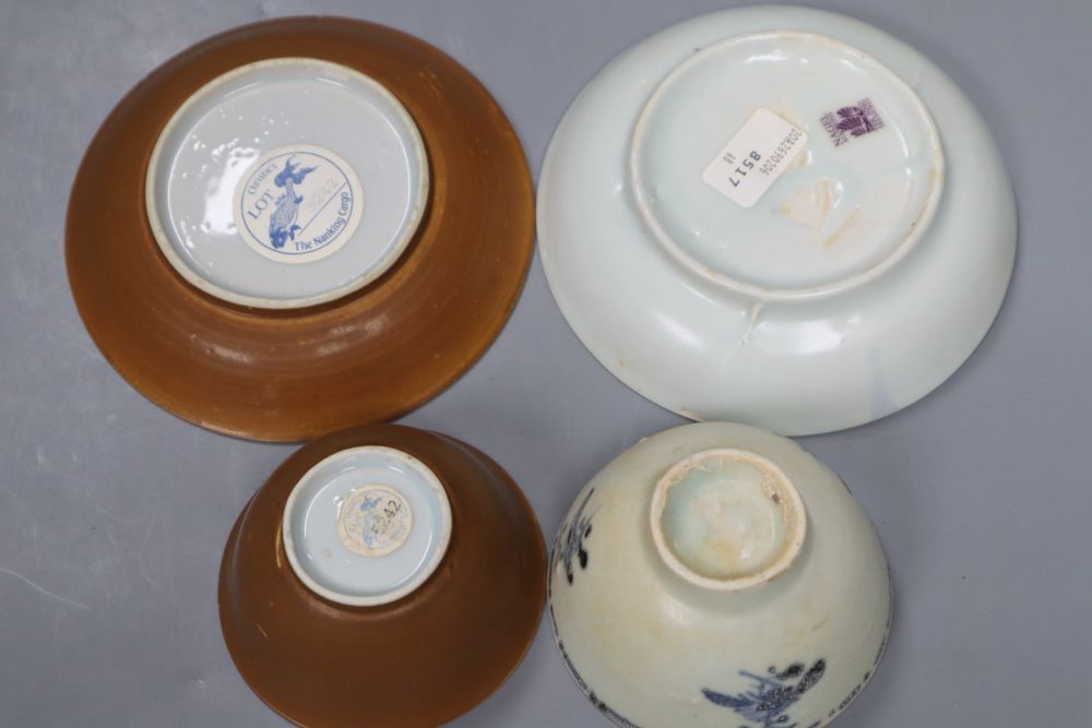 A Chinese Nanking Cargo Batavia tea bowl and saucer and Tek Sing Cargo blue and white tea bowl and saucer